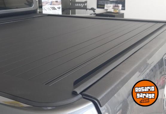 Accesorios para Autos - TAPA RETRACTIL ROLL PRO PARA NISSAN 22, AMAROK RANGER S10 HILUX, MAVERICK - En Venta