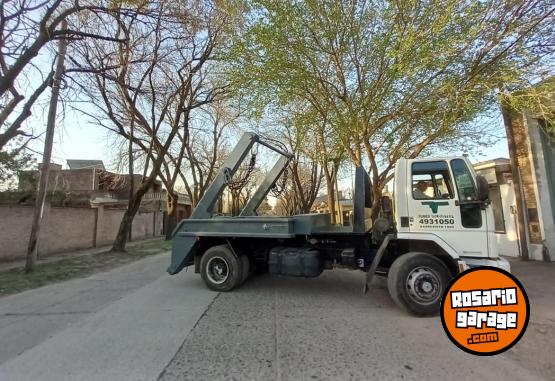 Camiones y Gras - CAMION FORD 1517 CON EQUIPO HIDRAULICO PORTA VOLQUETES - En Venta