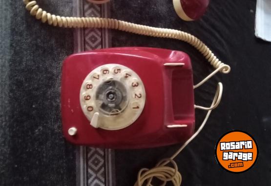 Telefona - TELEFONO ANTIGUO Y CABEZA  TALLADA - En Venta