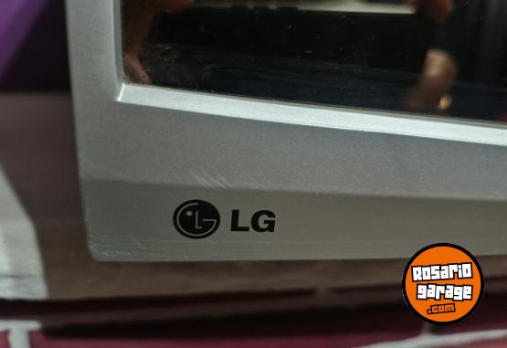 Hogar - Microondas LG 25 litros 800 watts. C/ Grill Impecable...frente espejado. - En Venta