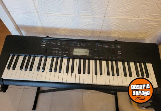 Instrumentos Musicales - Vendo teclado CASIO. Con FUNDA Y PIE PORTATIL. - En Venta