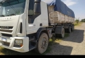 Camiones y Gras - Iveco Tector 170 E28 2018/ batea Ombu 2021 - En Venta