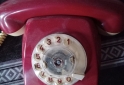 Telefona - TELEFONO ANTIGUO Y CABEZA  TALLADA - En Venta