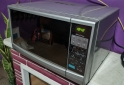 Hogar - Microondas LG 25 litros 800 watts. C/ Grill Impecable...frente espejado. - En Venta