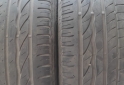 Accesorios para Autos - Juego de Cubiertas BRIDGESTONE TURANZA ER300 205 60 16 - En Venta